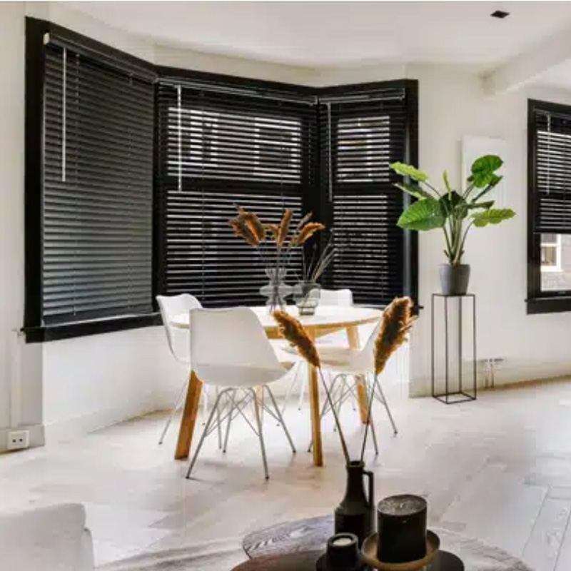 new black blinds in dining room